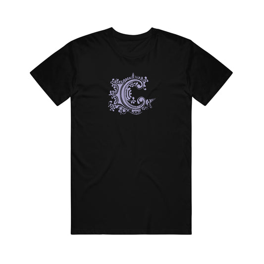 image of the front of a black tee shirt on a white background. center chest print in purple of chiodos' C logo
