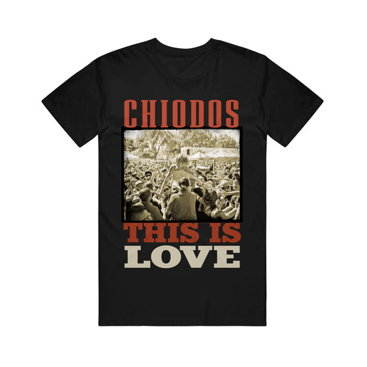 image of a black tee shirt. tee has full body print that says chiodos at the top and then an image of craig owens crowdsurfing. at the bottom says this is love